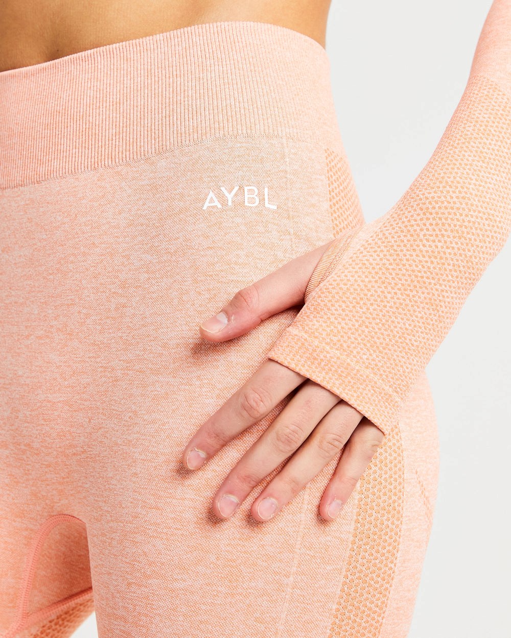 AYBL Motion Seamless Long Sleeve Crop Top Peach Marl | 584307-AUV